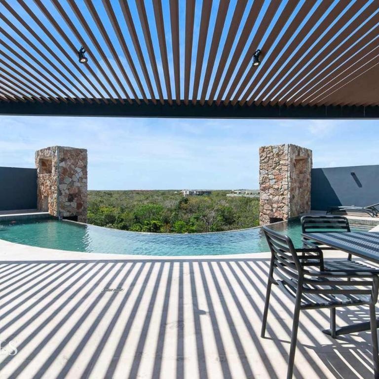 Stylish Pool View • 1BR w/Balcony • Sauna + Gym - Apartment - 9