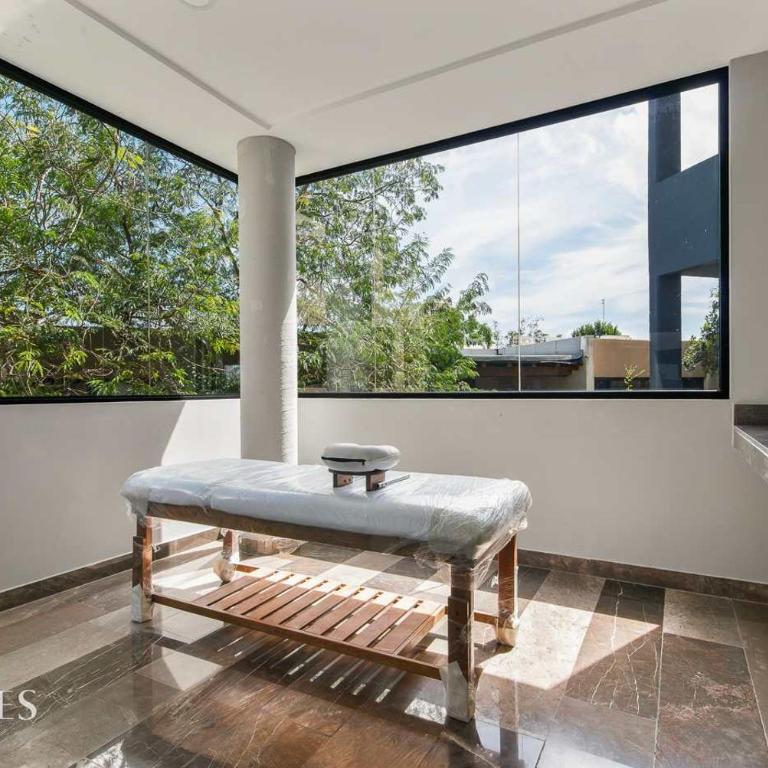Stylish Pool View • 1BR w/Balcony • Sauna + Gym - Apartment - 12
