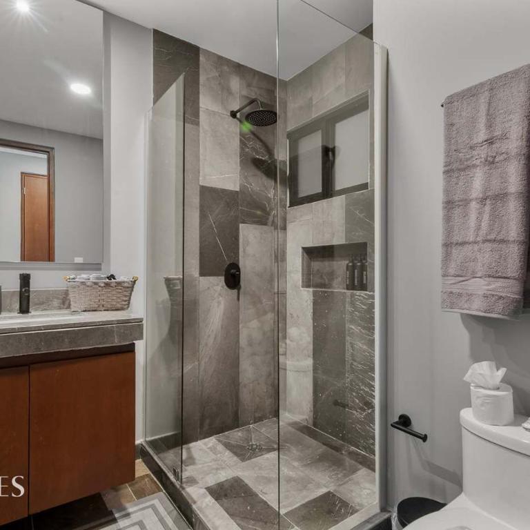 Stylish Pool View • 1BR w/Balcony • Sauna + Gym - Apartment - 26