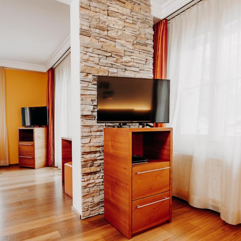 Parkhotel Schoenegg - Junior Suite mit Balkon und Bergblick - 1