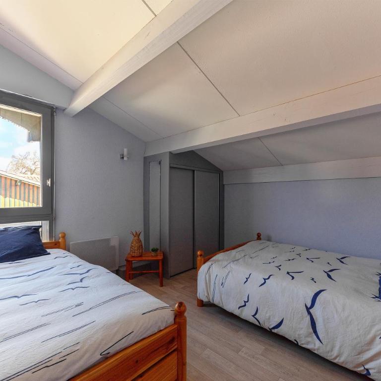 Villa 13 - En duplex jardin privé à 400m du lac - Casa con 2 Camere da Letto - 4