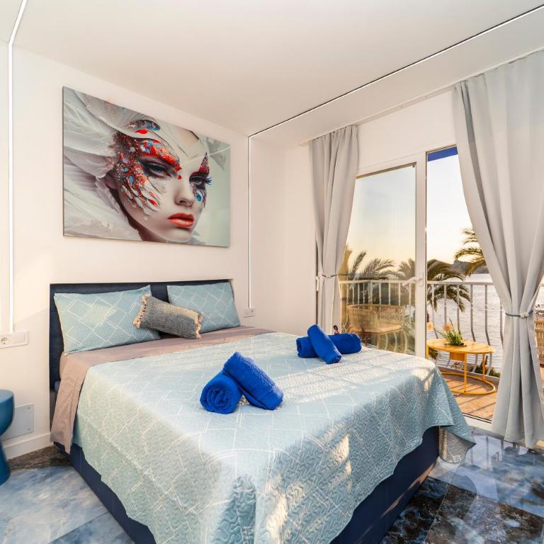 Apartamentos Brisas del Poniente - Habitación Doble Deluxe con balcón y vistas al mar - 1