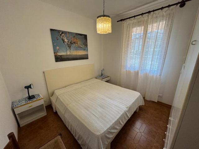 Villa Pineta Mare - Appartamento con 2 Camere da Letto e Vista Giardino - 11
