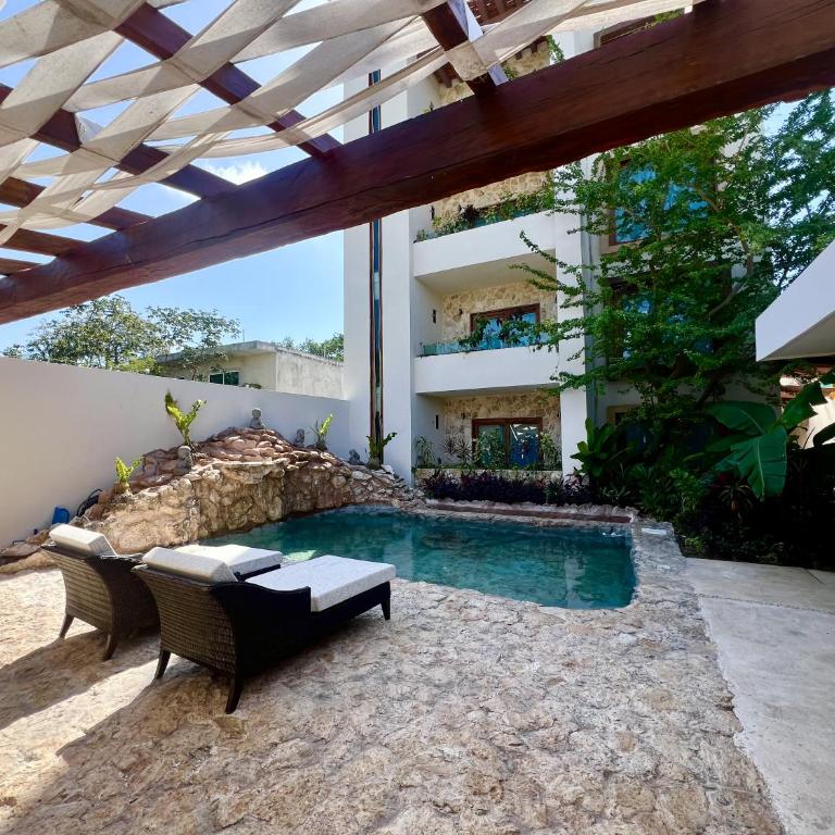 Ha'as Naj Suites Bananas - One-Bedroom Apartment with Pool View - 1
