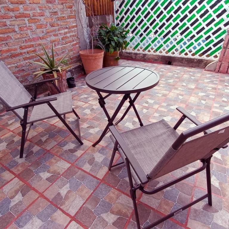 Cuarto tipo loft con terraza - Habitación Doble con baño privado - 2 camas - 13