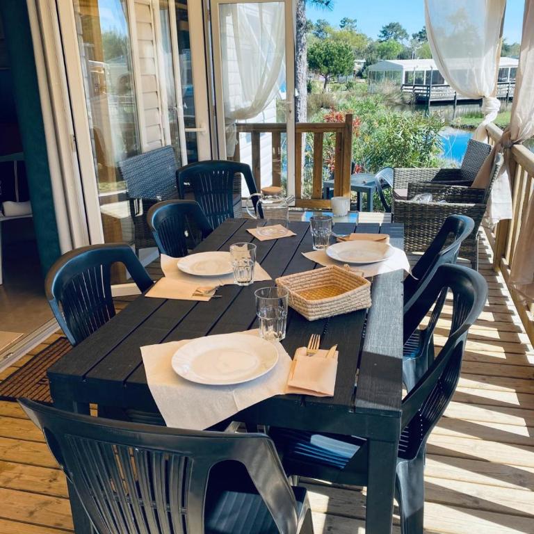 Mobilhome 8 personnes cosy tout équipé avec vue sur bassin, cap ferret - Bungalow Familiare - 5