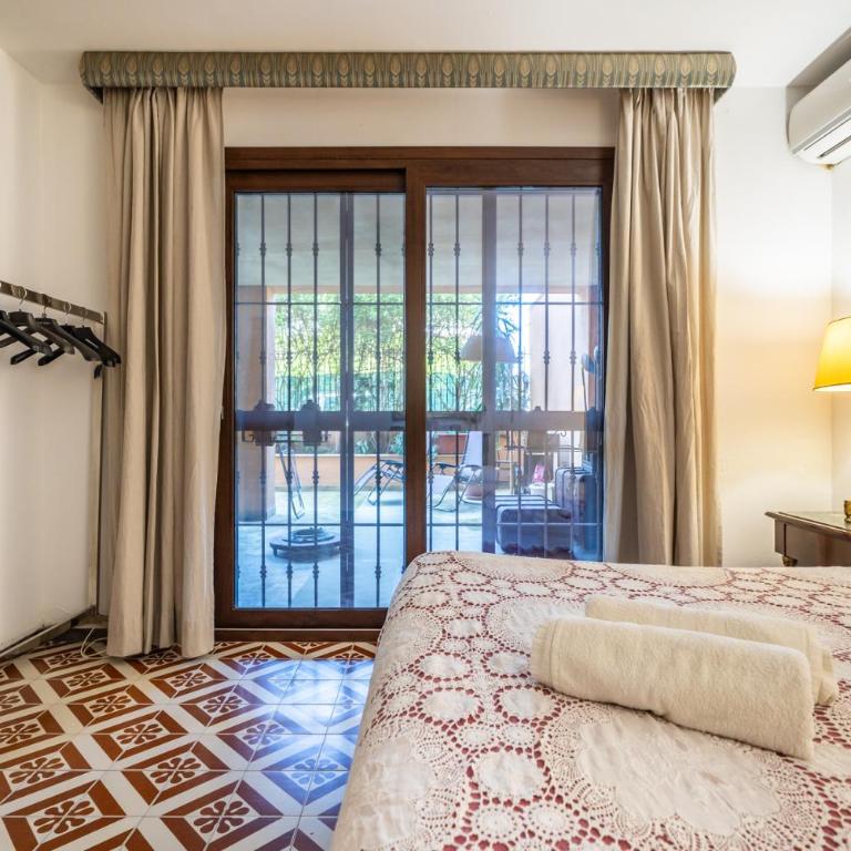 Villa a pochi passi dal mare - Appartamento con 2 Camere da Letto e Vista Giardino - 24