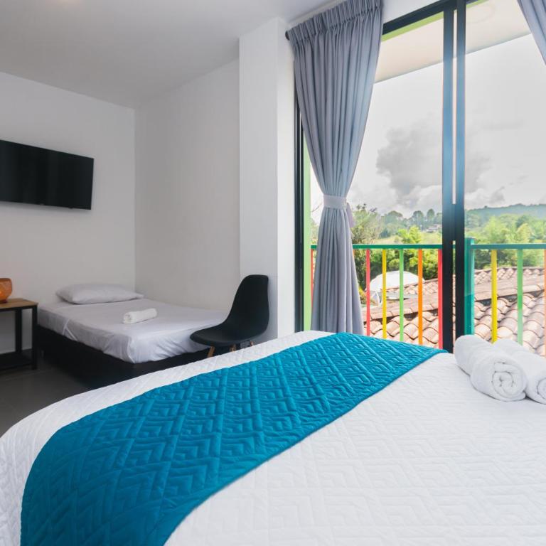 Guatapé Country House Hotel - Habitación Triple con balcón - 3