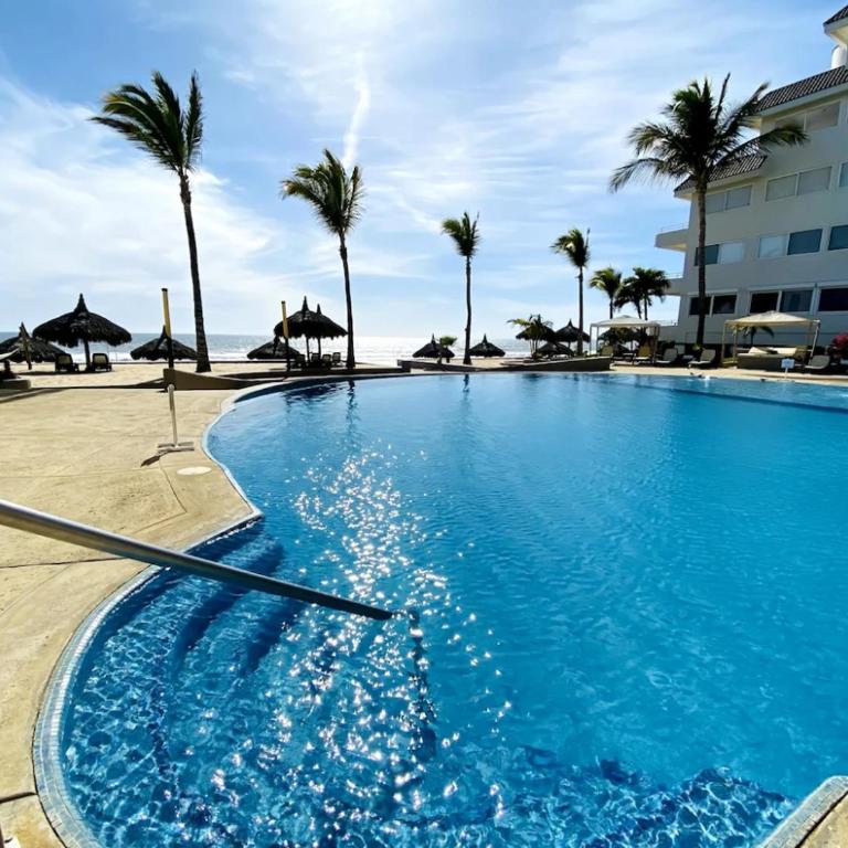 FRENTE AL MAR A PIE DE PLAYA CON ALBERCA yJACUZZY - Two-Bedroom Apartment - 20