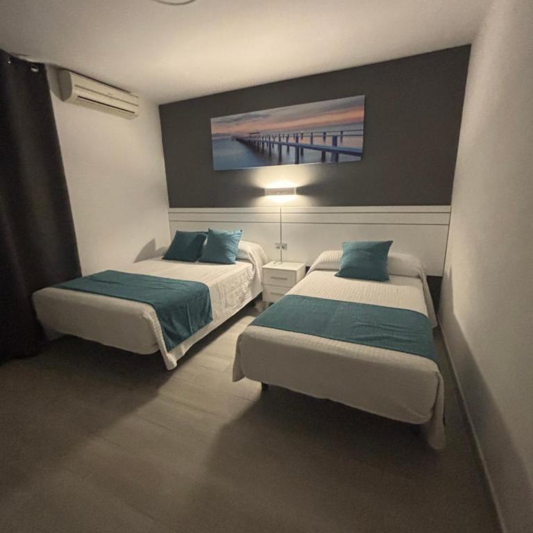 Hostal Los Mellizos - Chambre Triple - Vue sur la Piscine - 8