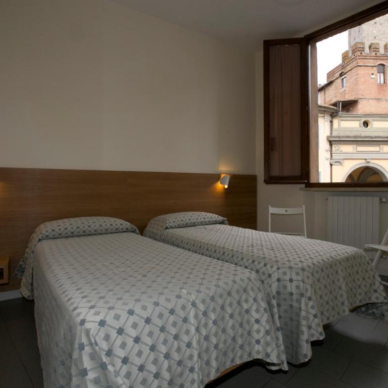 Hotel La Perla - Camera Doppia con Letti Singoli - 1