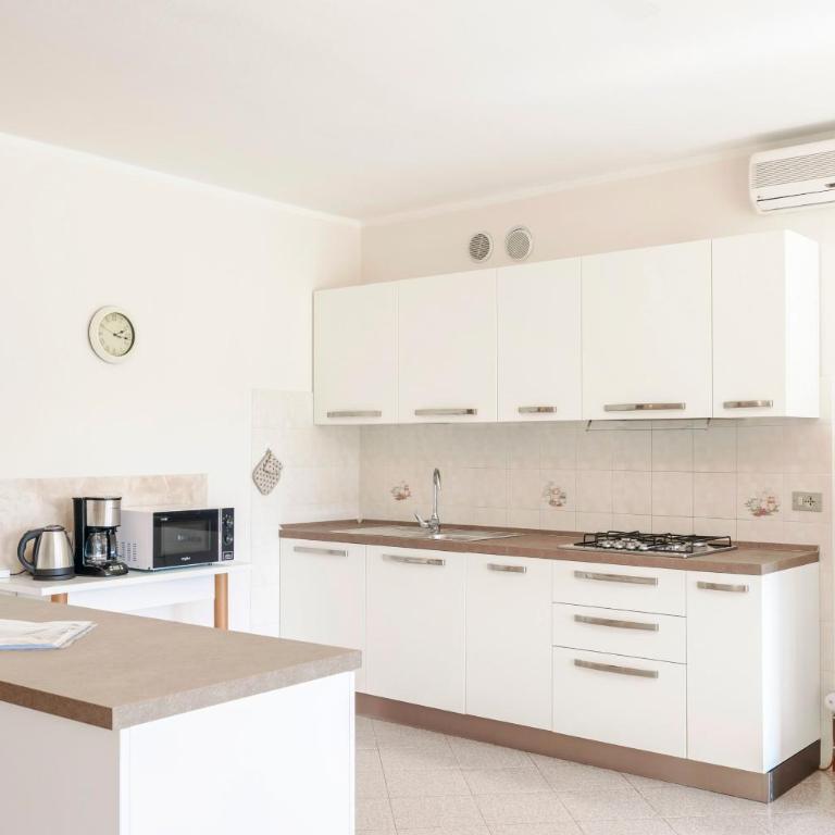 RUSTICO PARK DELLE ROSE - Regarda Travel - Appartamento con Vista Giardino - 12