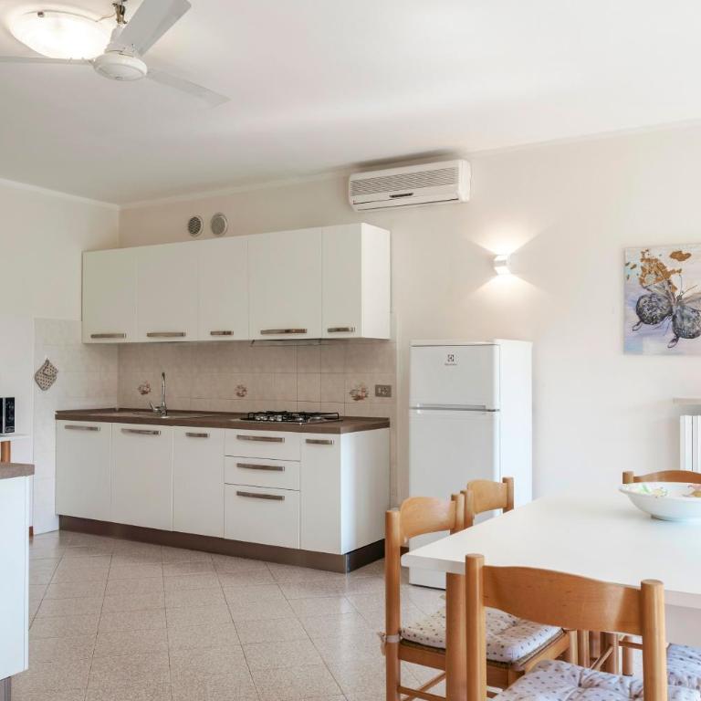 RUSTICO PARK DELLE ROSE - Regarda Travel - Appartamento con Vista Giardino - 5