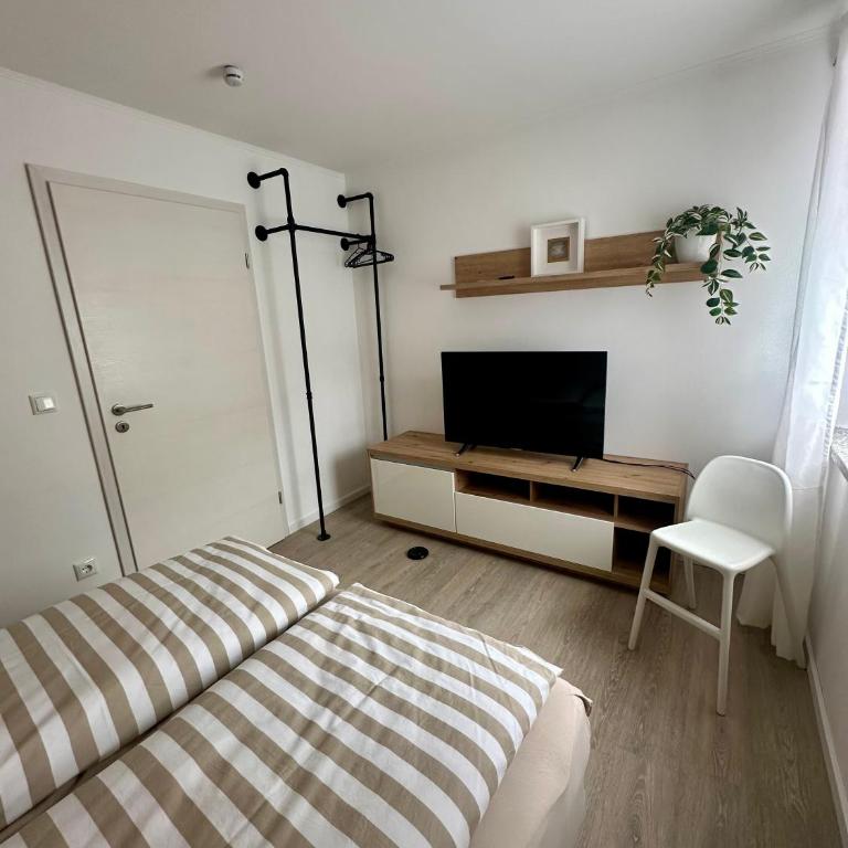 Ferienwohnung Hollmann - Apartment mit 2 Schlafzimmern und Gartenblick - 9