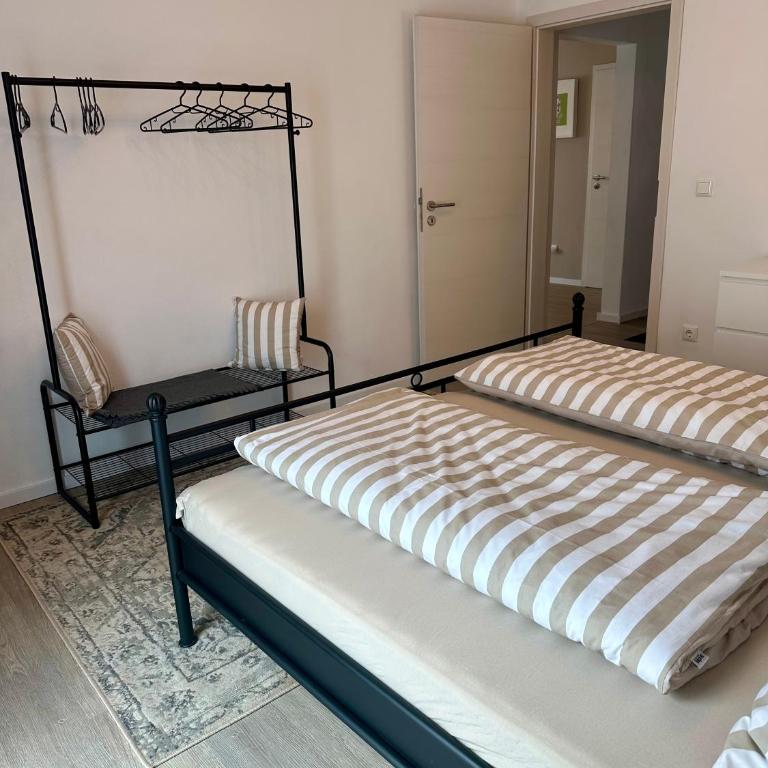 Ferienwohnung Hollmann - Apartment mit 2 Schlafzimmern und Gartenblick - 13