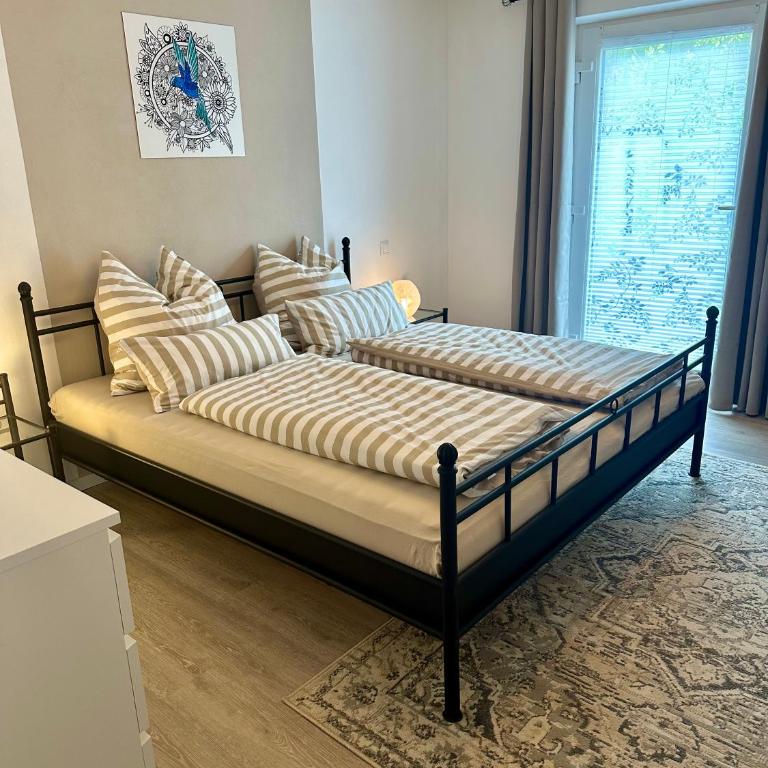 Ferienwohnung Hollmann - Apartment mit 2 Schlafzimmern und Gartenblick - 14