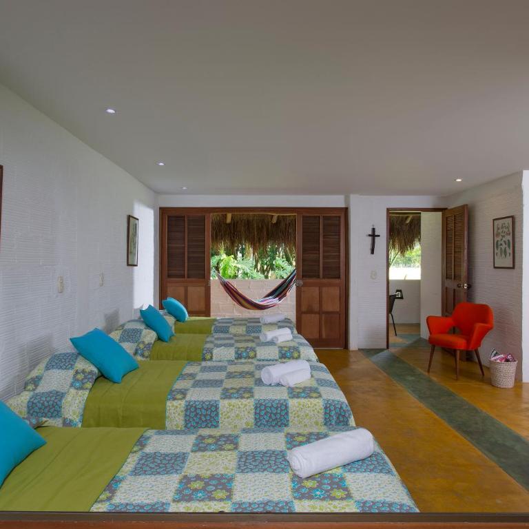 Hotel Cinaruco Caney - Habitación Cuádruple - vistas al jardín - 6