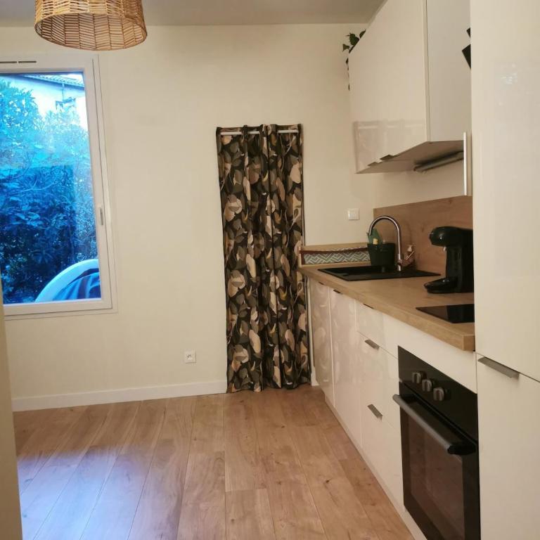 Cozy en centre ville dans un écrin de verdure - Appartement 2 Chambres - 4