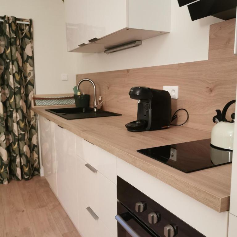 Cozy en centre ville dans un écrin de verdure - Appartement 2 Chambres - 5