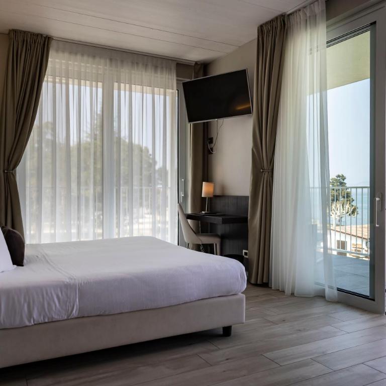 Vision Hotel - Junior Suite con Vista Lago - 2