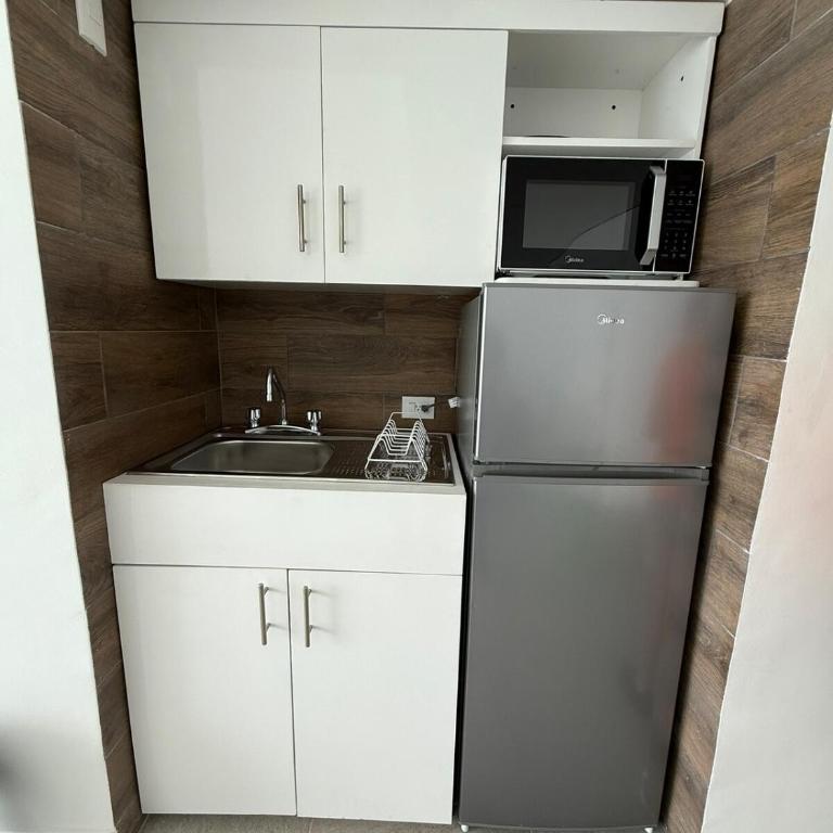 Departamento con vista al mar y playa privada - Apartamento de 1 dormitorio - 14