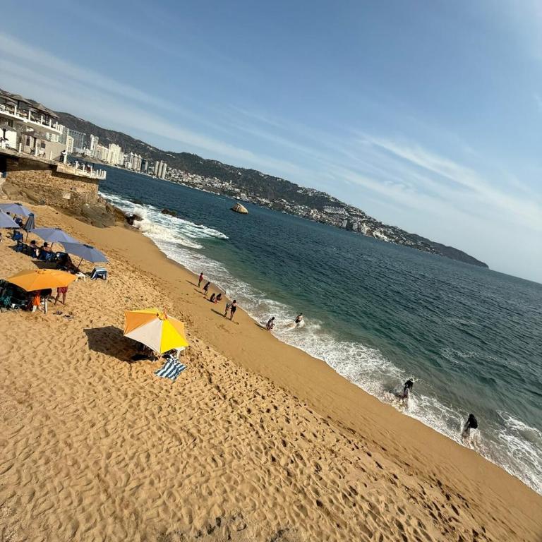 Departamento con vista al mar y playa privada - Apartamento de 1 dormitorio - 25