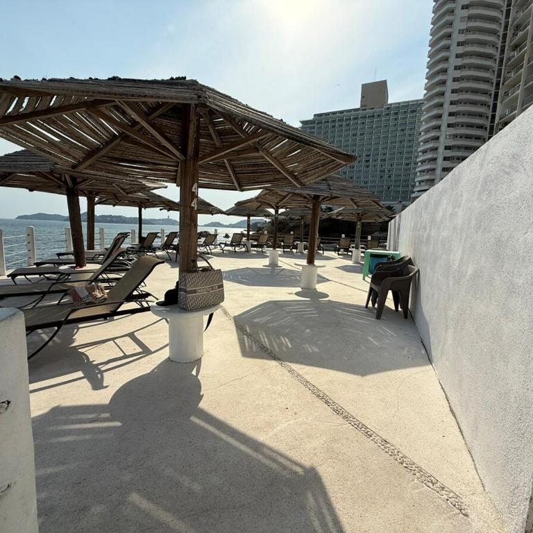 Departamento con vista al mar y playa privada - Apartamento de 1 dormitorio - 36