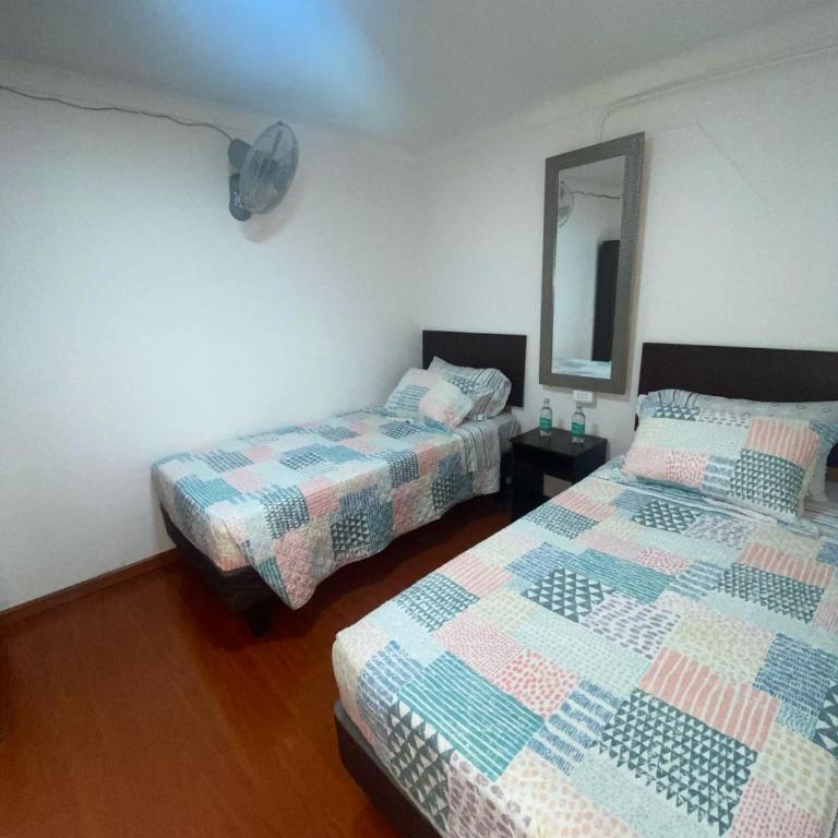Hospedaje Nuevo Amanecer - Cama individual en dormitorio mixto - 3