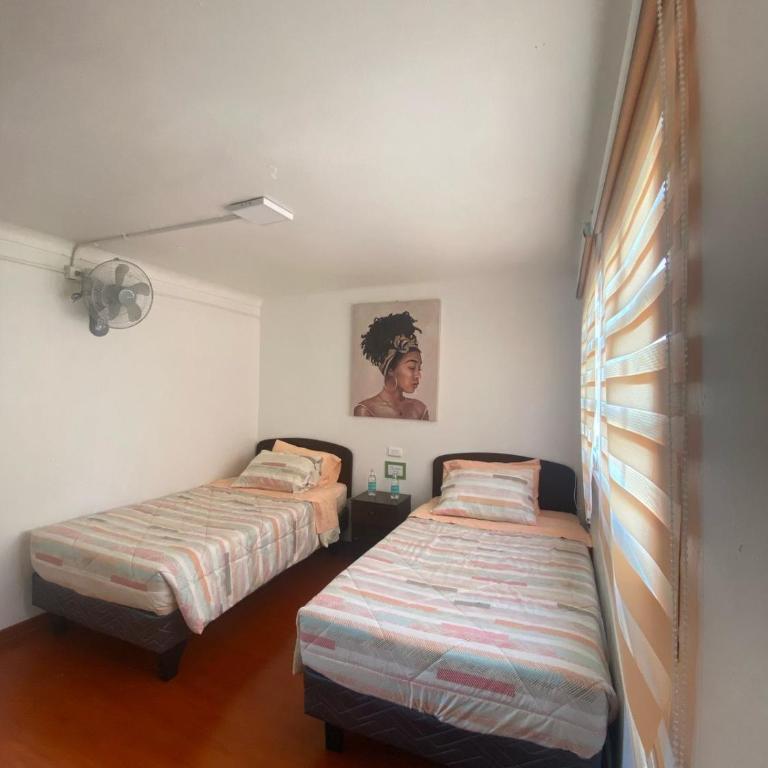 Hospedaje Nuevo Amanecer - Cama individual en habitación compartida - 4