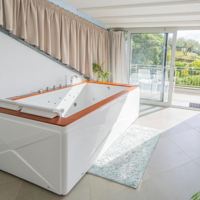 Agri Suite with jacuzzi - La Bilaia - Suite con vistas al mar - 33