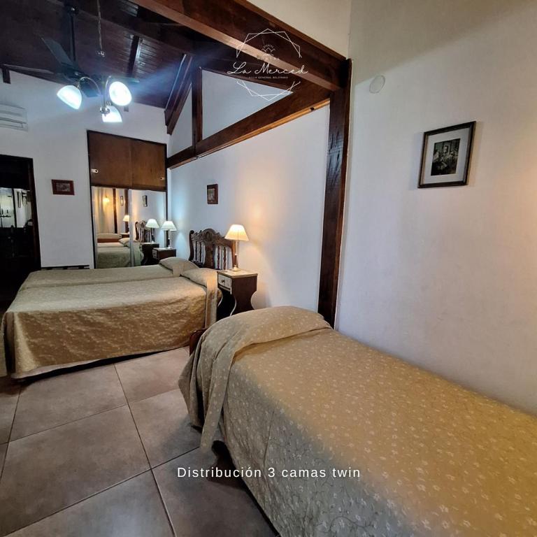 Hostal La Merced - Habitación Triple con vistas al jardín - 5