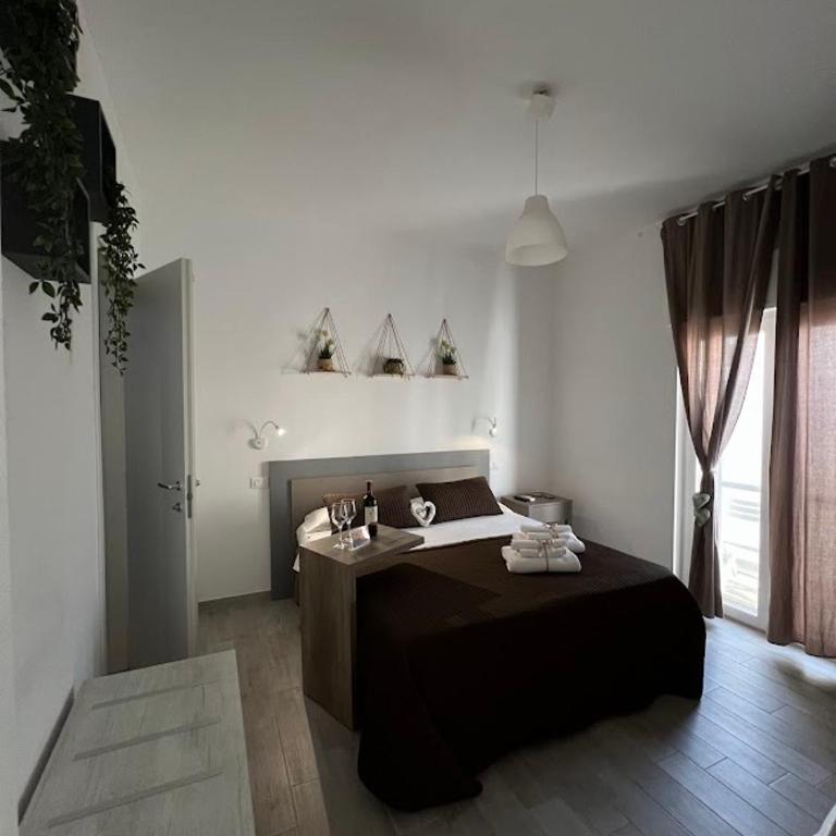 Radici Mare B&B - Camera Deluxe Matrimoniale/Doppia con Letti Singoli con Bagno Privato - 9
