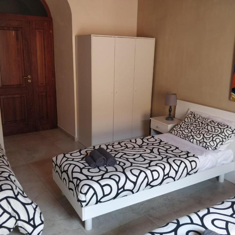 Kalos Rooms - Camera Tripla Comfort - 16