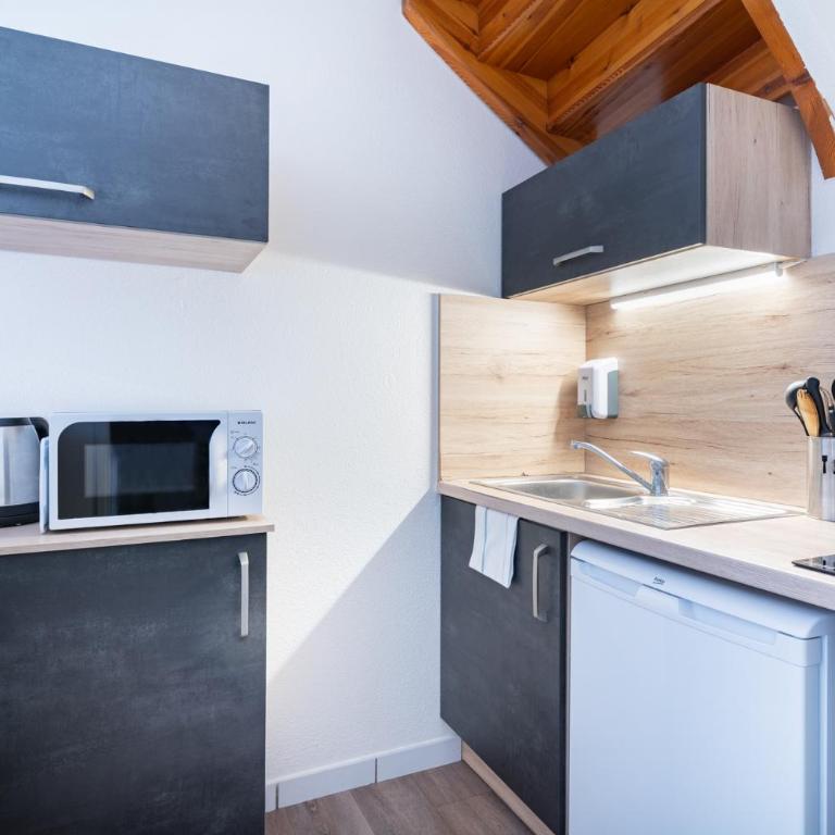 Séjours & Affaires Annecy Le Pont Neuf - Appartement en Duplex - 5