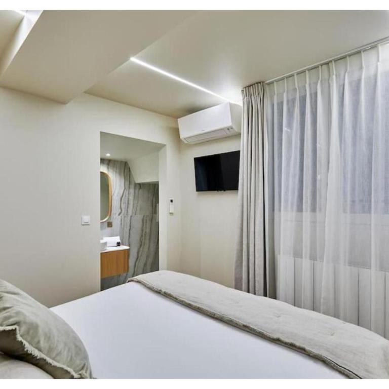 Apartment Le Marais place des Vosges by Studio prestige - Two-Bedroom Apartment - 2