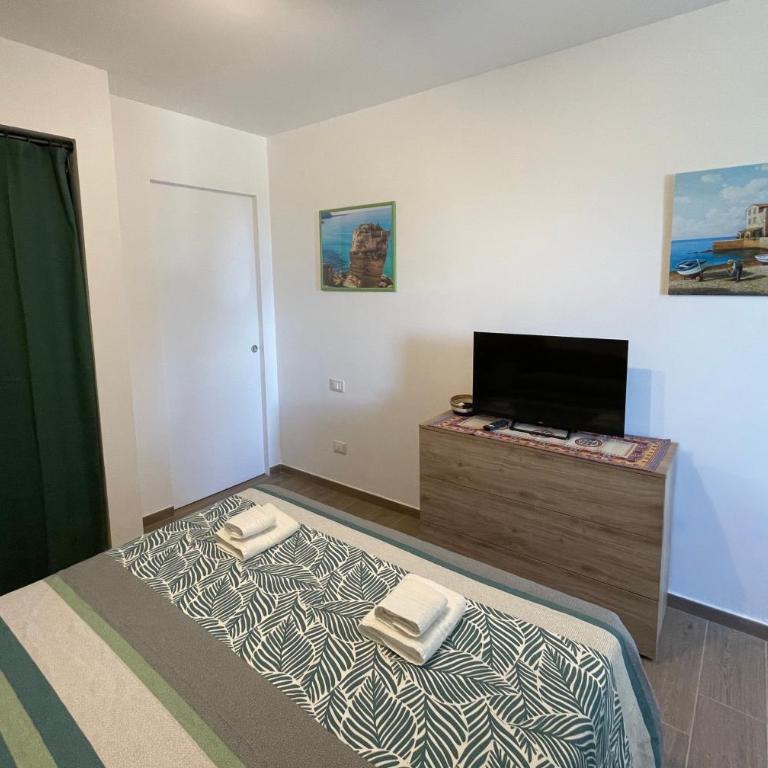 VFH Residence Flavia -Tre Piscine - Appartamento con 2 Camere da Letto, Terrazza e Vista Mare - 10