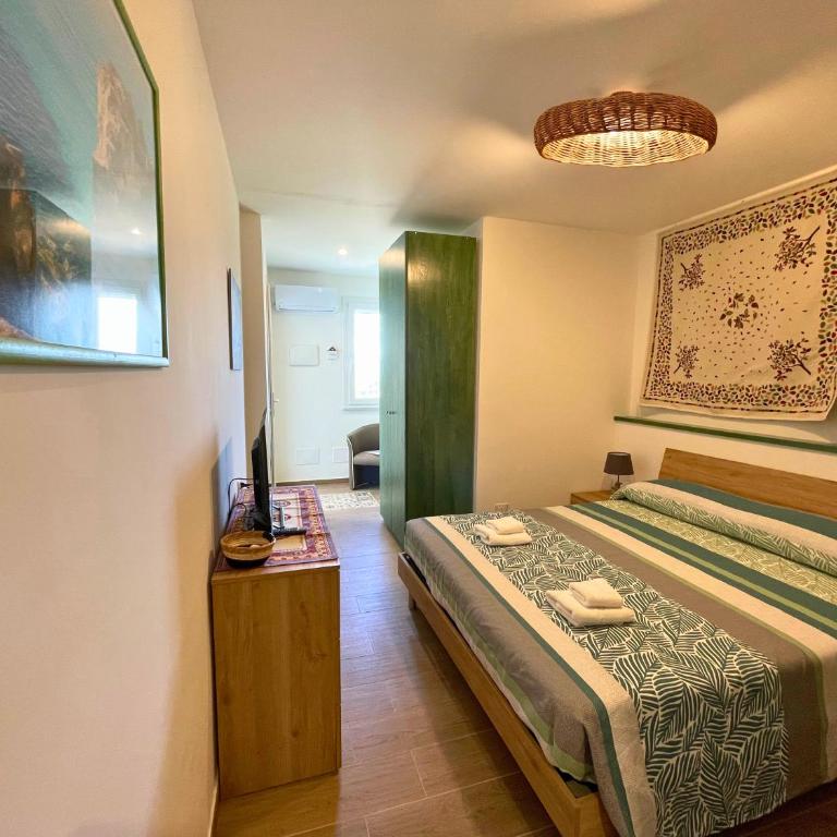 VFH Residence Flavia -Tre Piscine - Appartamento con 2 Camere da Letto, Terrazza e Vista Mare - 12
