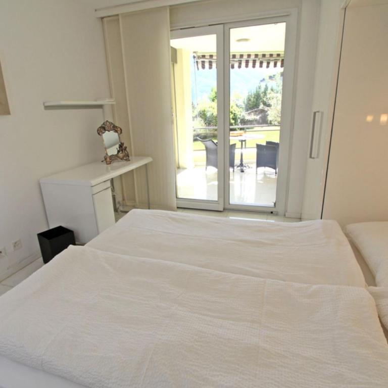 Residenza Ascomonte, Parterre, App 29 by HolAp SA - Appartamento con Vista Lago - 5