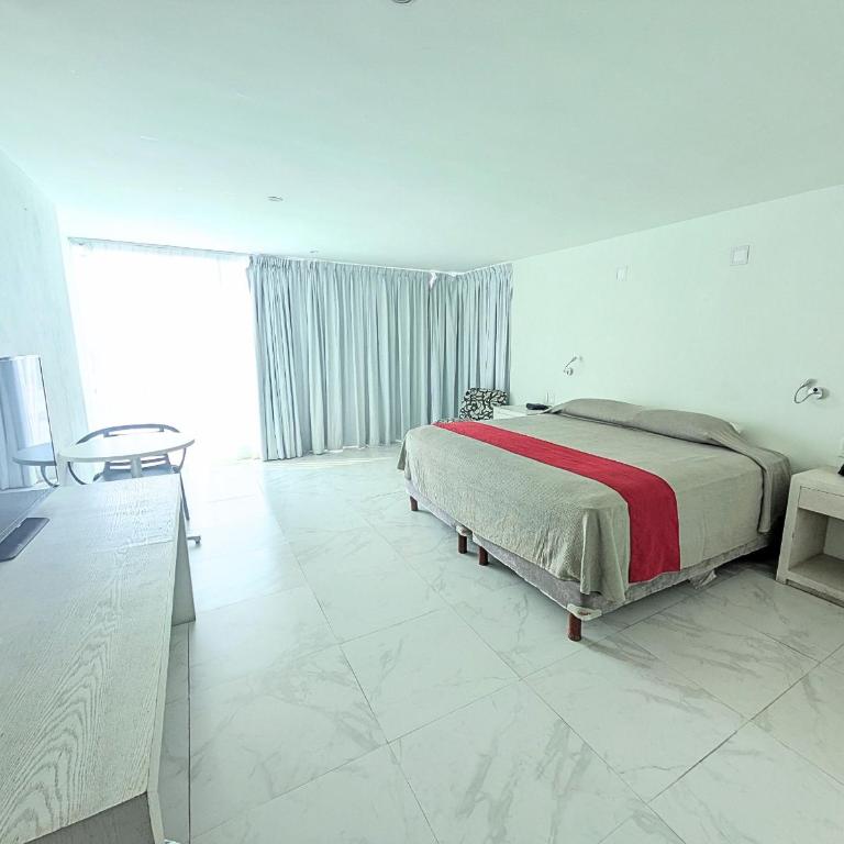 We Hotel Acapulco - Habitación con cama extragrande y vistas a la costa - 4