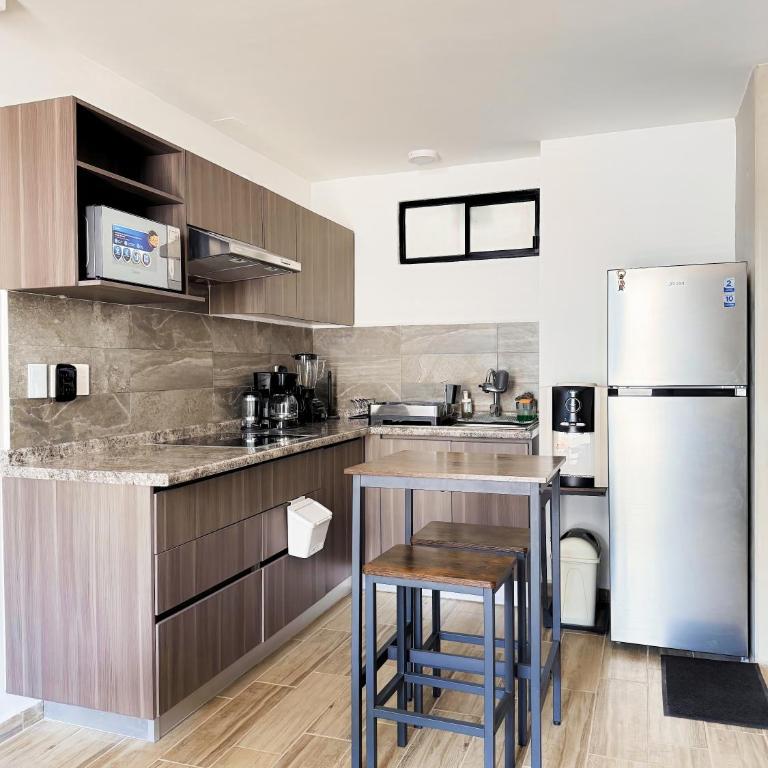 Departamento Completo con Terraza, Alberca y Gimnasio - Apartamento de 2 dormitorios - 8