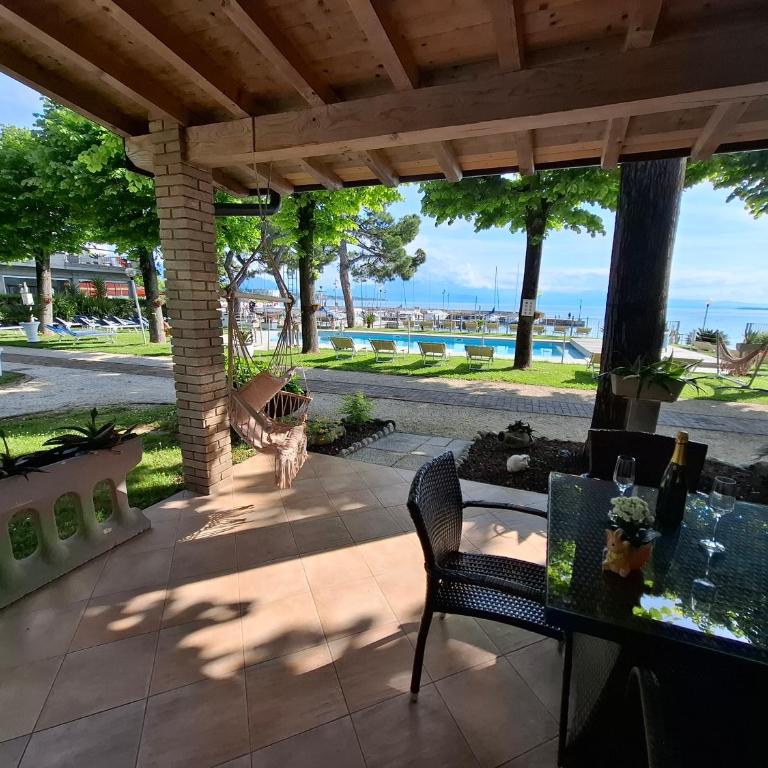 Villaggio Turistico dei Tigli - Apartment mit Seeblick - 6