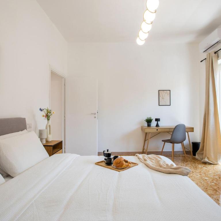 Ampio appartamento familiare Metro A a 50m - Appartamento Deluxe con 2 Camere da Letto - 53