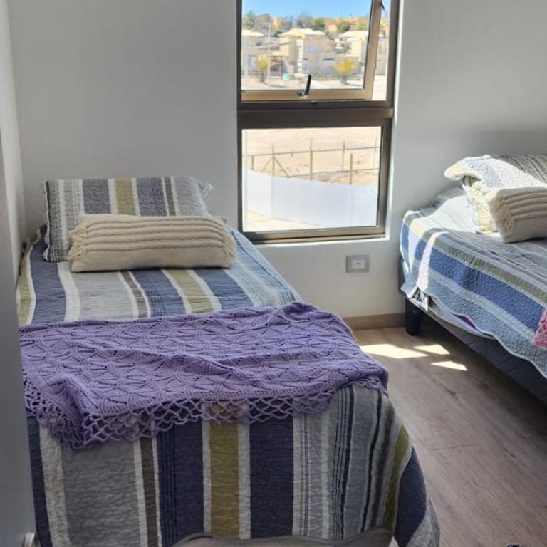Steps to the beach, comfortable - Two-Bedroom Apartment - 1