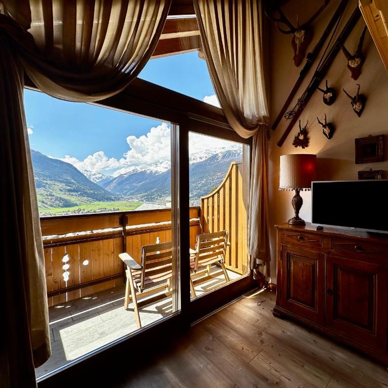 Alpine Escape 4 - Appartamento con 1 Camera da Letto, Balcone e Vista Montagna - 10