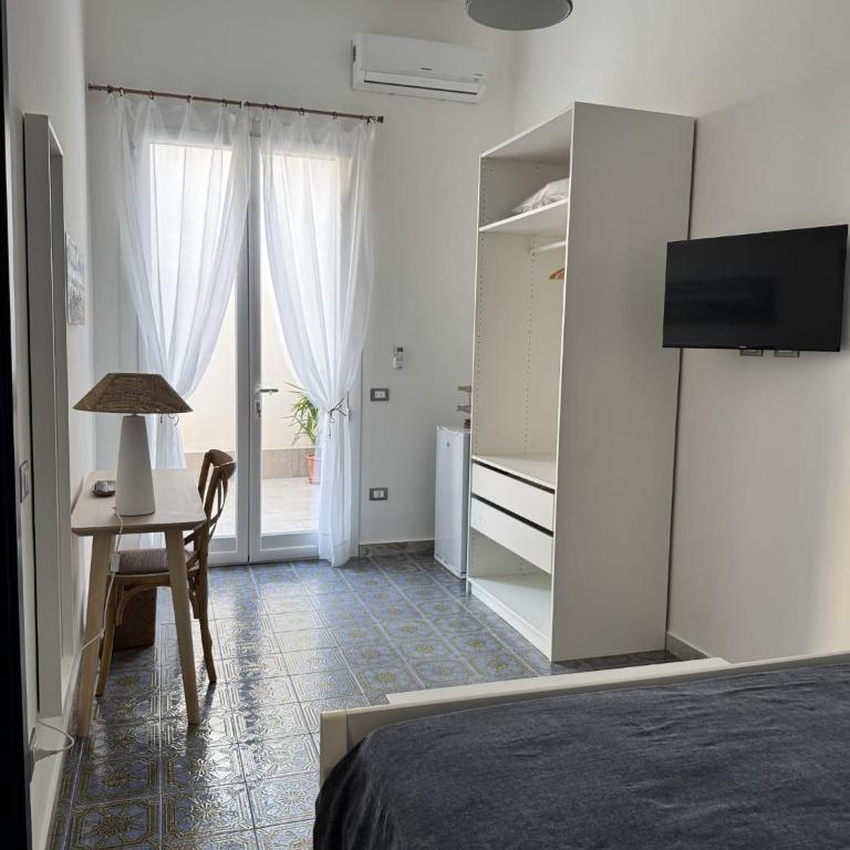 La Casa dei palmizi - Camera Matrimoniale con Terrazza - 15