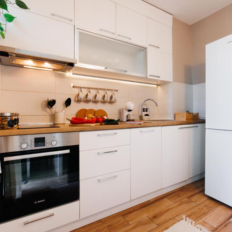 Bright Harmony with Balcony Old Town Renovated - Three-Bedroom Apartment with Balcony - 6