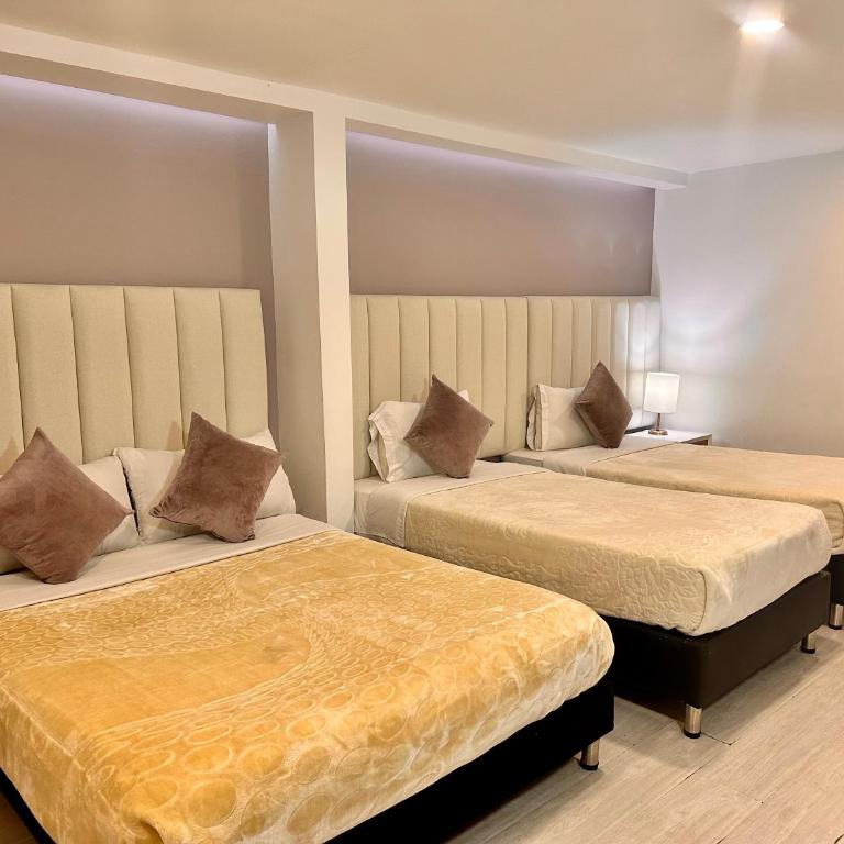 Hotel Agora Boutique - Habitación Cuádruple Estándar - 4