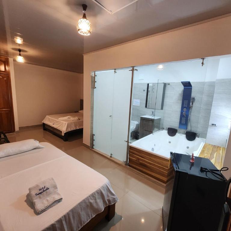Hotel tranquilandia La 14 - Suite Doble Deluxe - Cama grande - 3