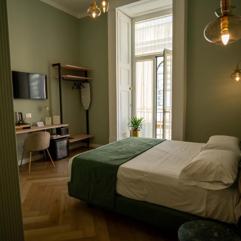 Boutique Luxury Suite - Camera Matrimoniale Deluxe con Balcone - 1