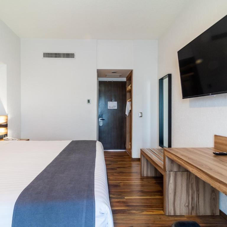 Mesón Ejecutivo Guadalajara - Nuevo Consulado Americano Monraz - Habitación Executive con cama extragrande - 9